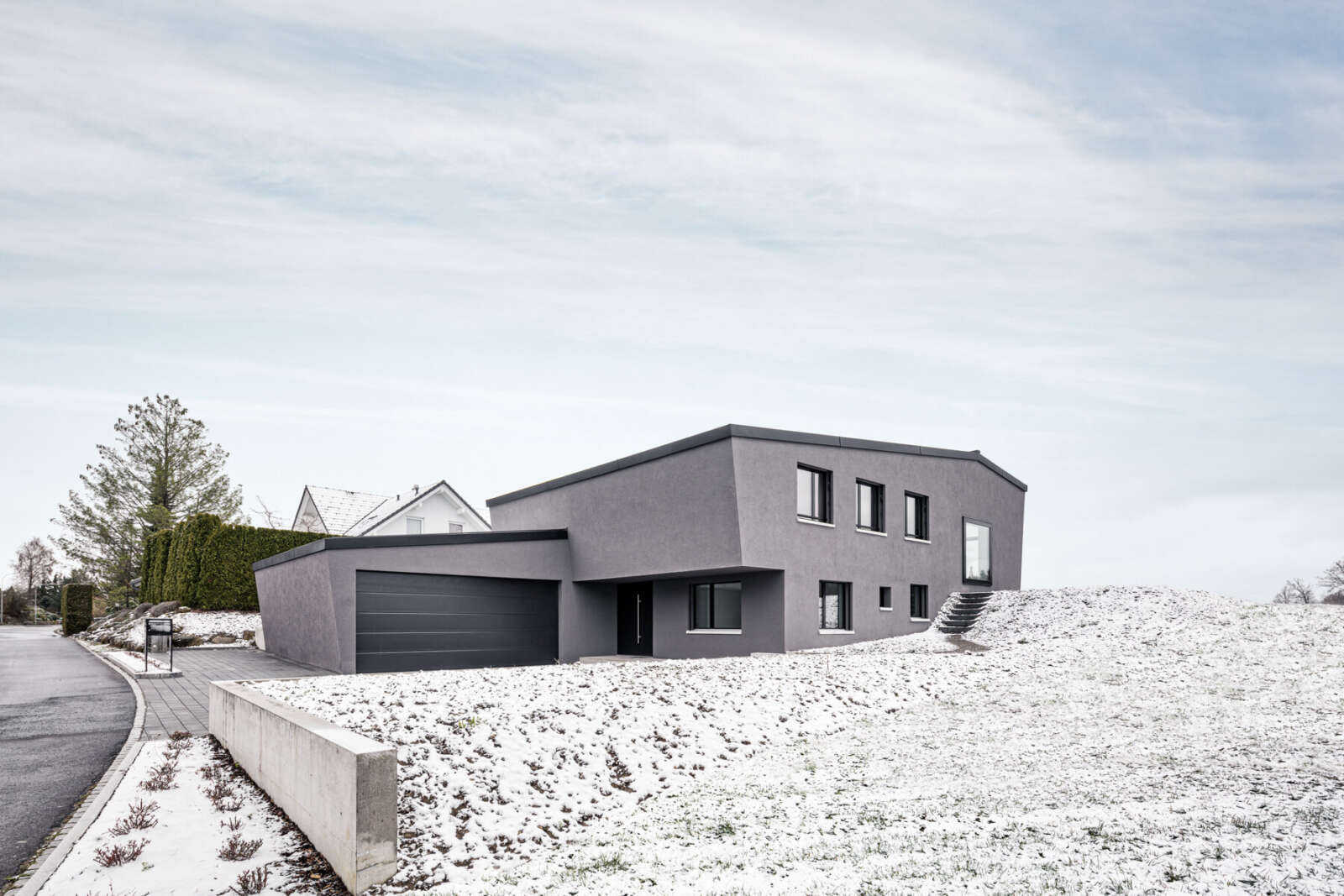 Orlando Architektur Neubau Einfamilienhaus Rigiblickstrasse Hausen am Albis 10 Aussenansicht