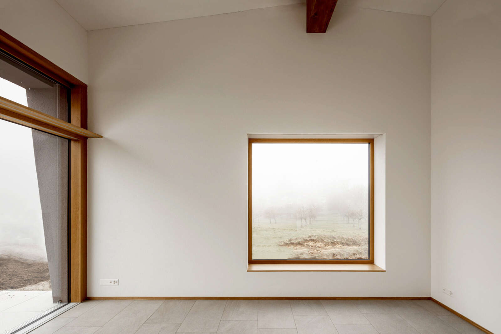Orlando Architektur Neubau Einfamilienhaus Rigiblickstrasse Hausen am Albis 7 Wohnen Fenster